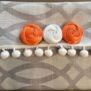 Decorative clutch purse with Orange and White Accents